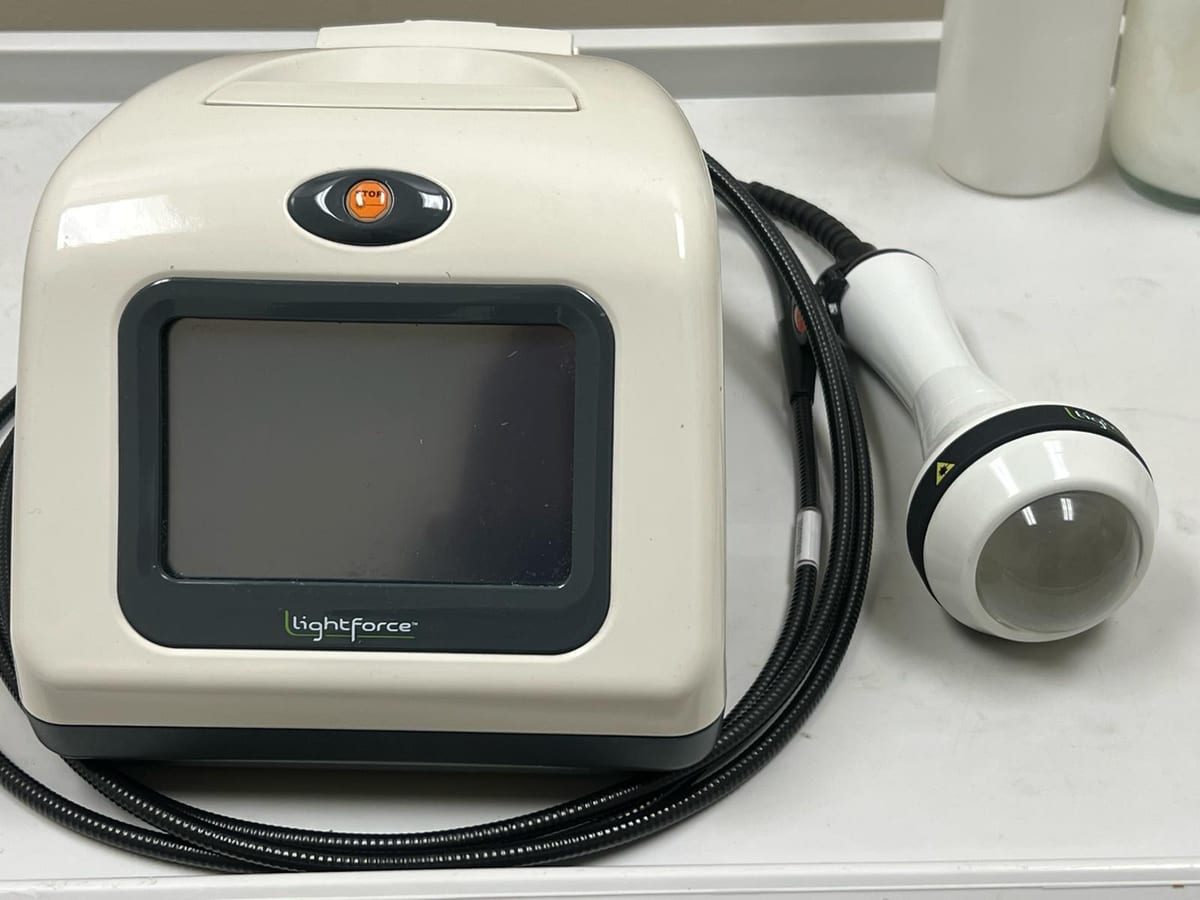 The clinic's own Class IV laser unit and treatment handpiece